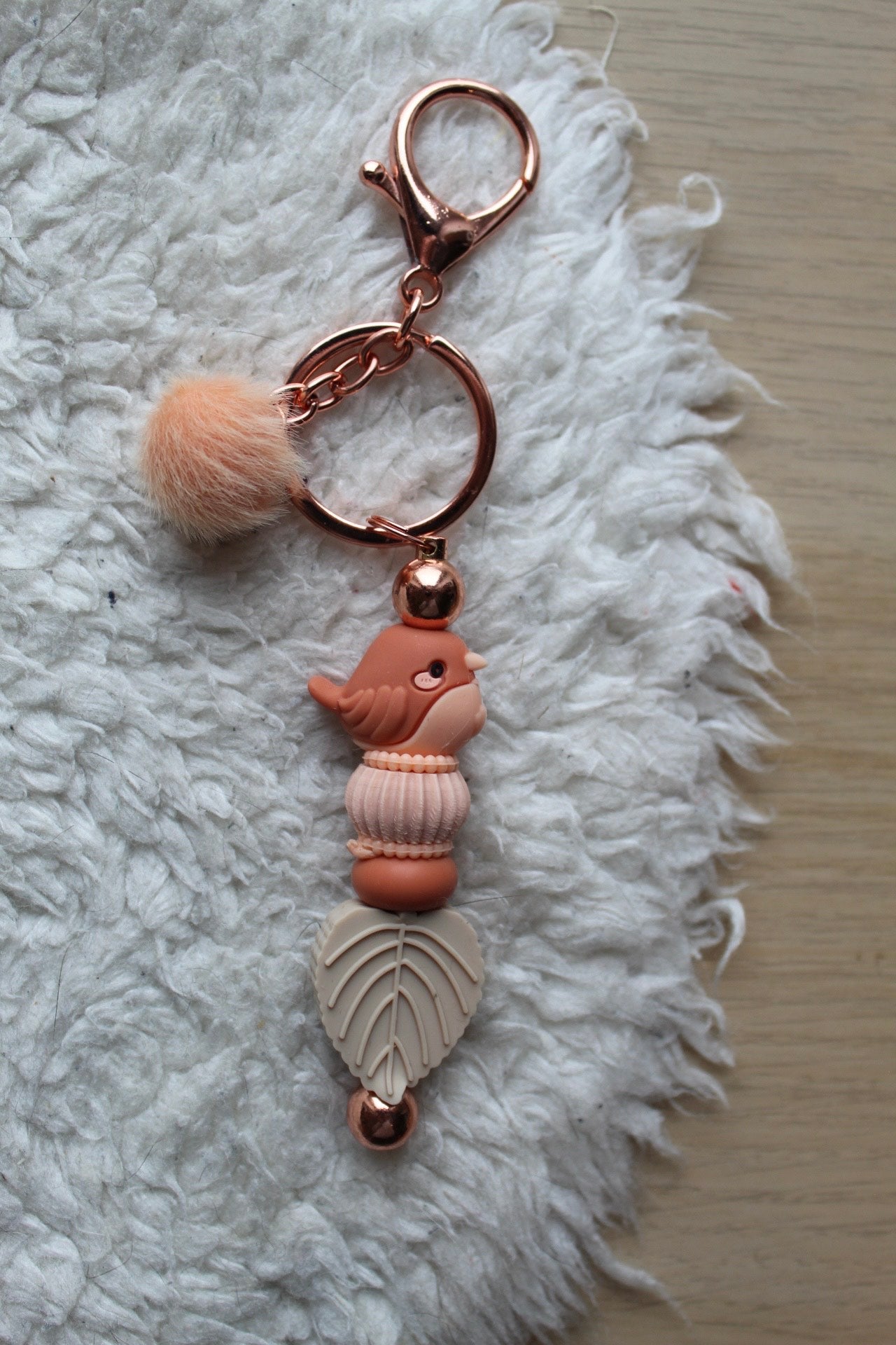 Vogeltje oranje/beige