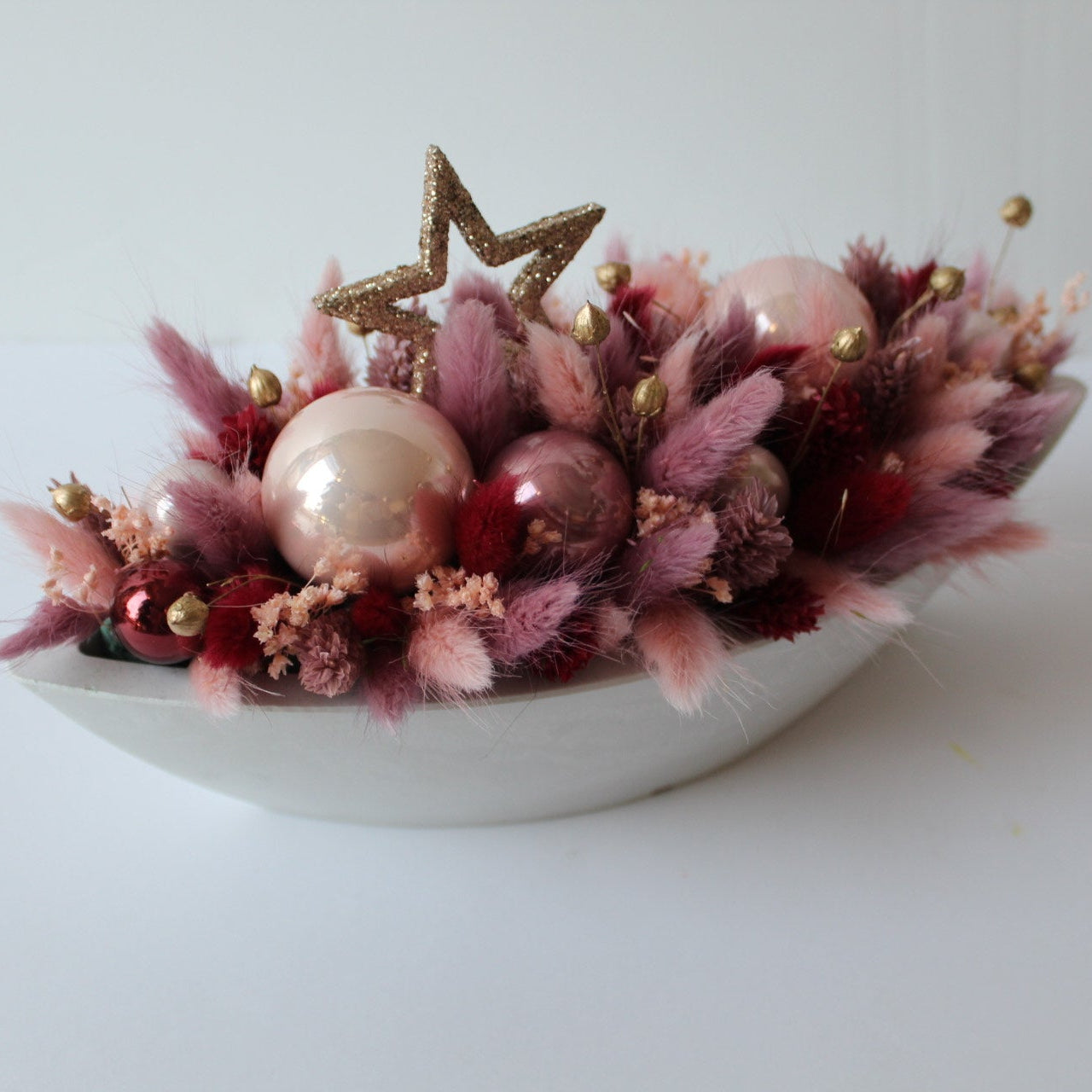 Bloemstuk kerst roze